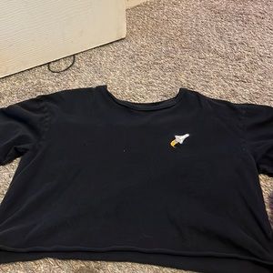 Plain black tee with spaceship embroidery
